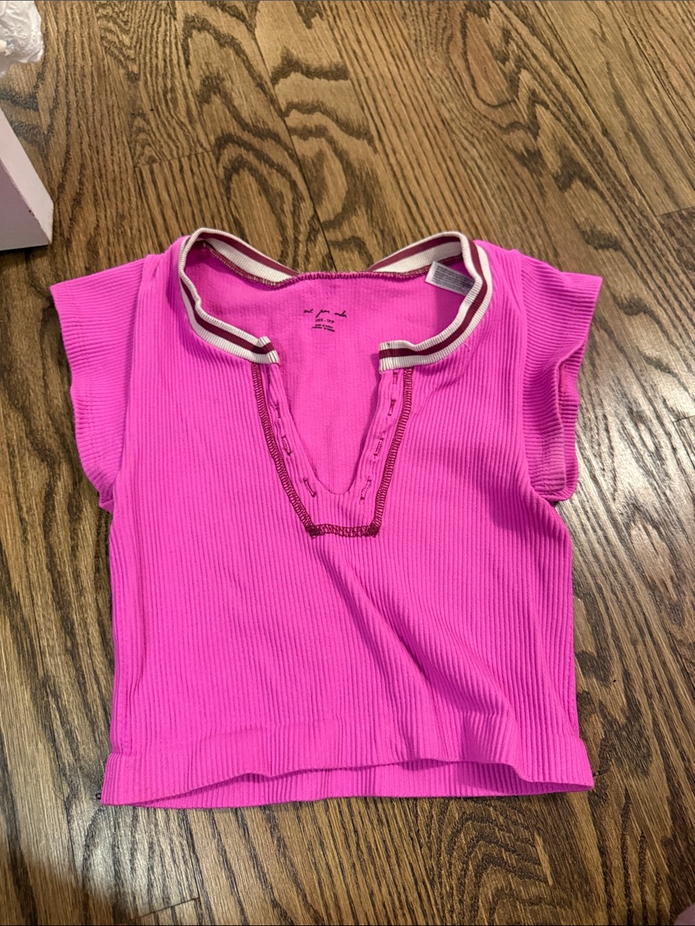 Urban outfitters- out from under pink top